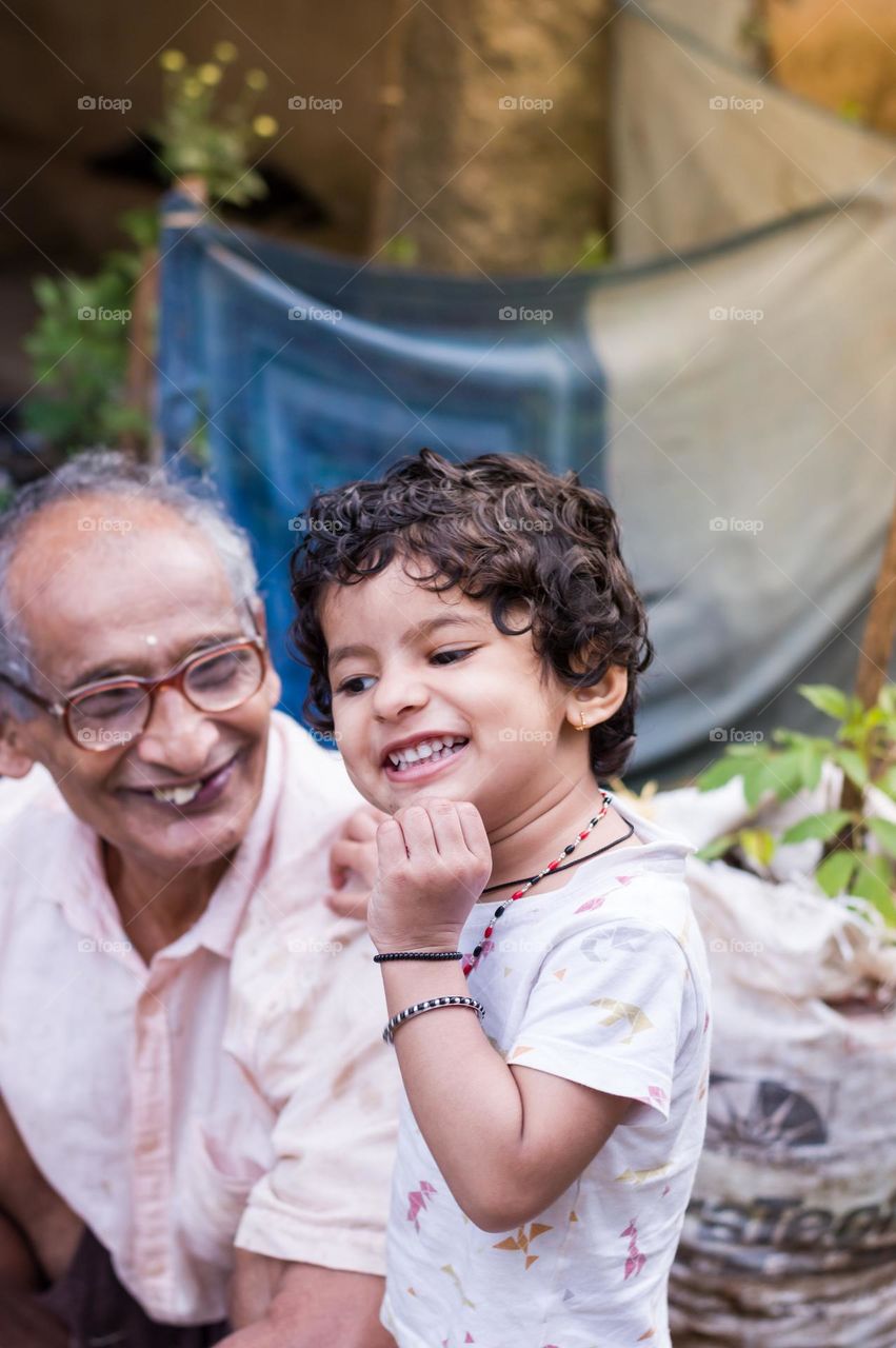 Beautiful bonding between grandfather and granddaughter.