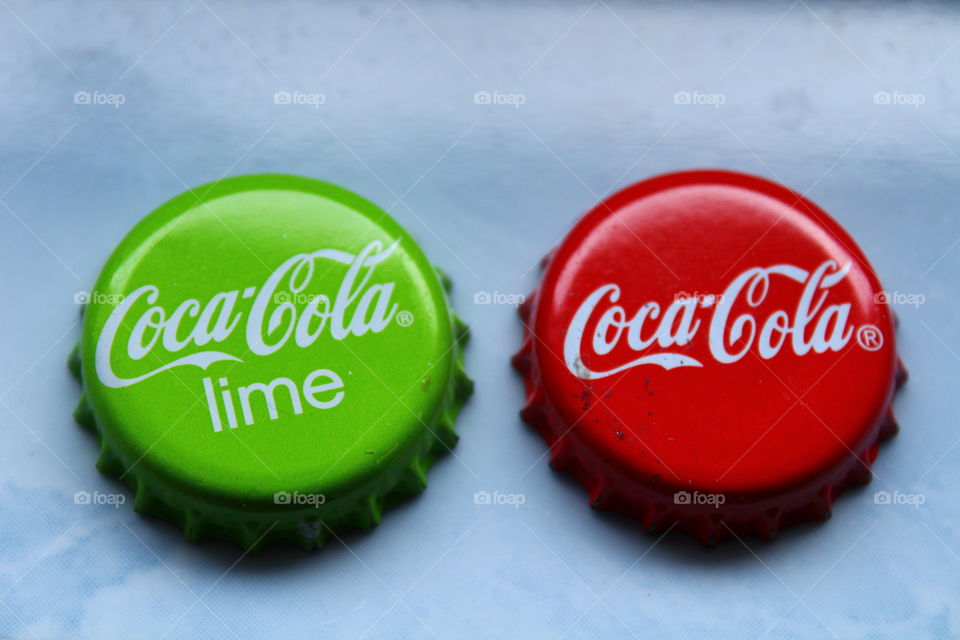 Coca cola caps green and red