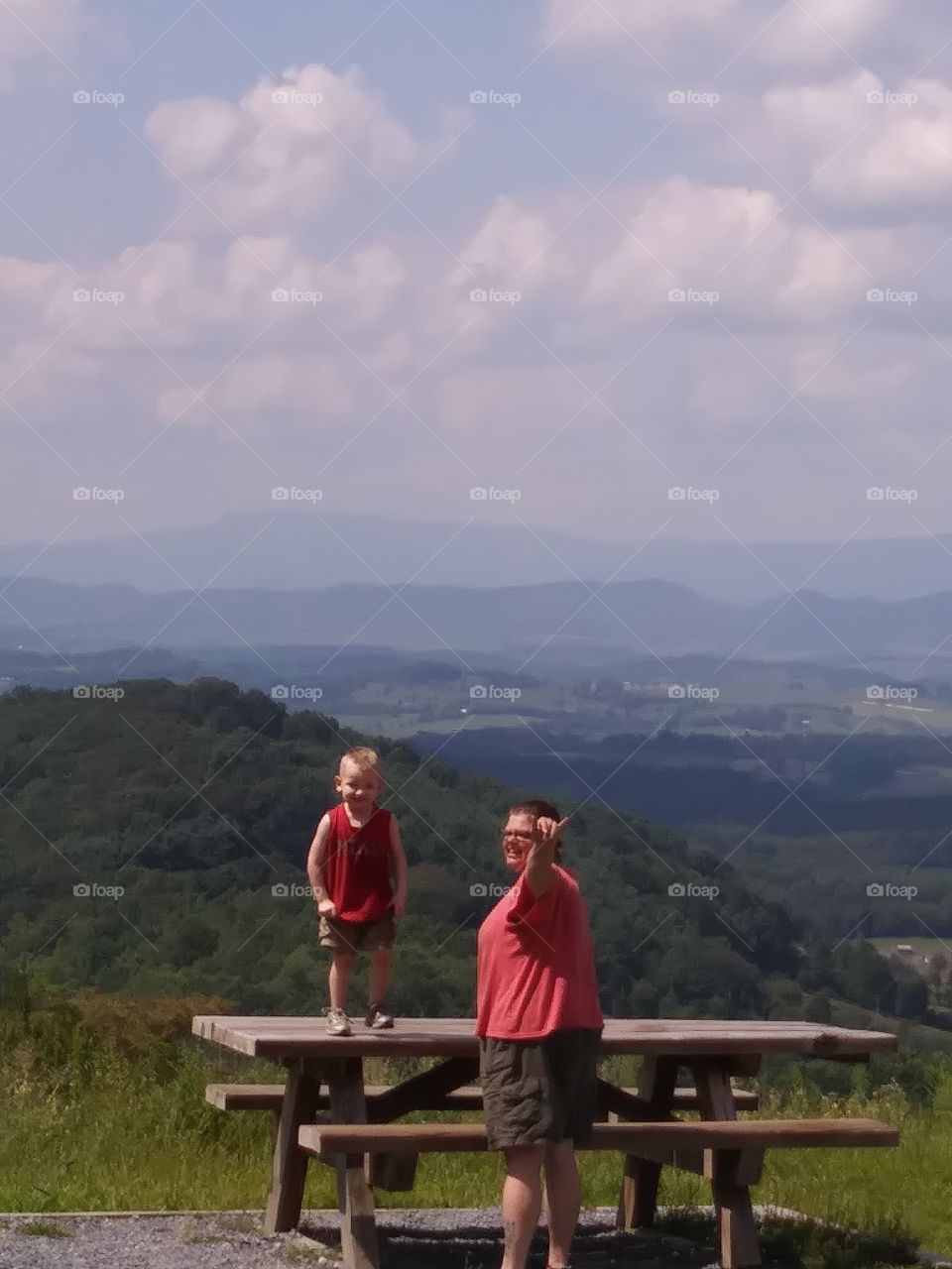 son and mother enjoying nature