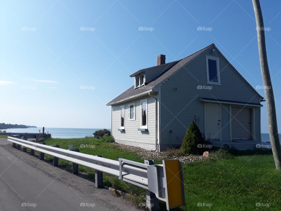 house behind the rail