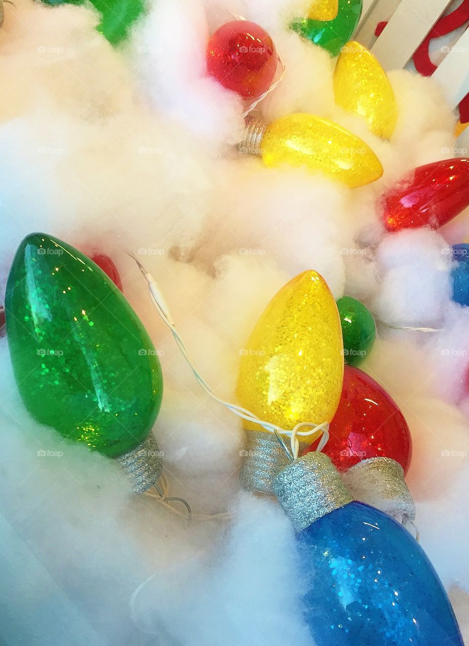 Christmas tree lights in a store window display