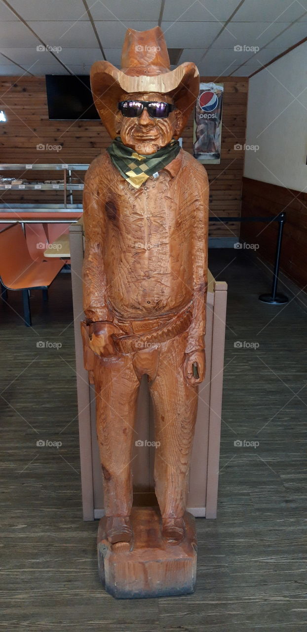 wooden statue in canada