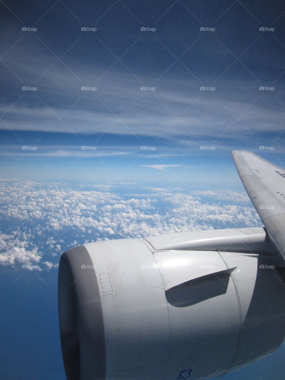 Above the sky. I happened to get a window seat and saw this beautiful cloudscape!
