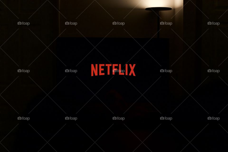 Netflix with a dimmed theatre light