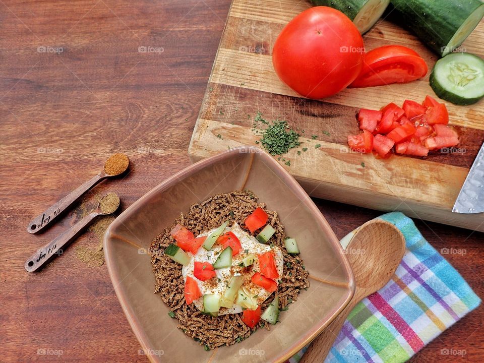 Bran cereal with yogurt and vegetable in bowl