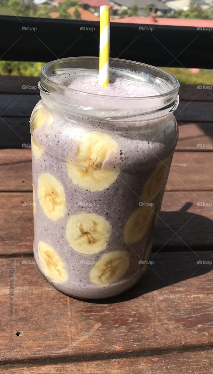 Sunshine and a banana blueberry smoothie 