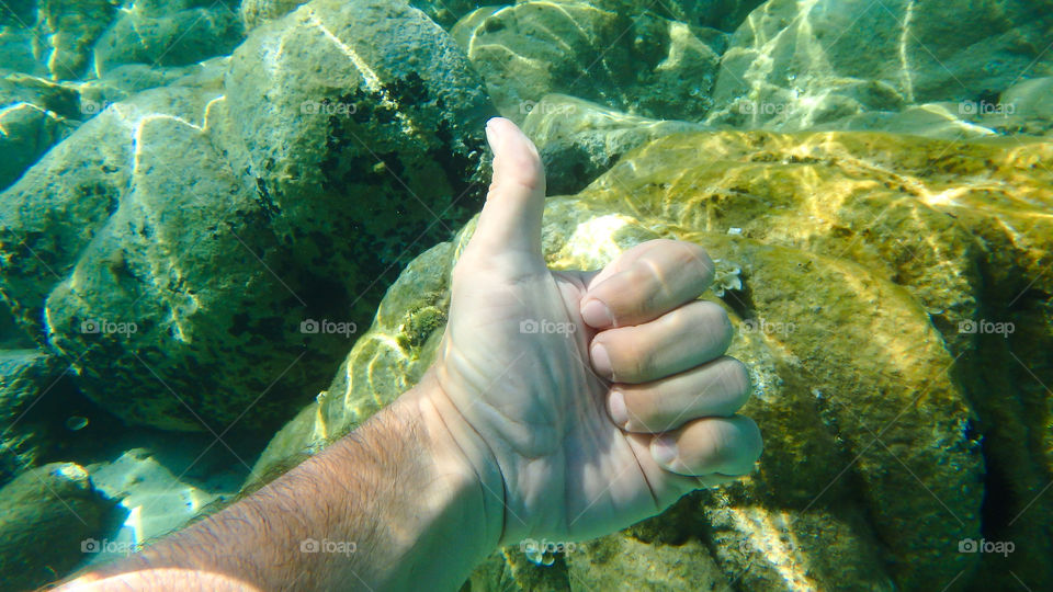 A person swimming undersea