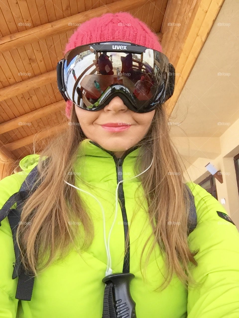 Selfie of smiling woman wearing Uvex ski glasses