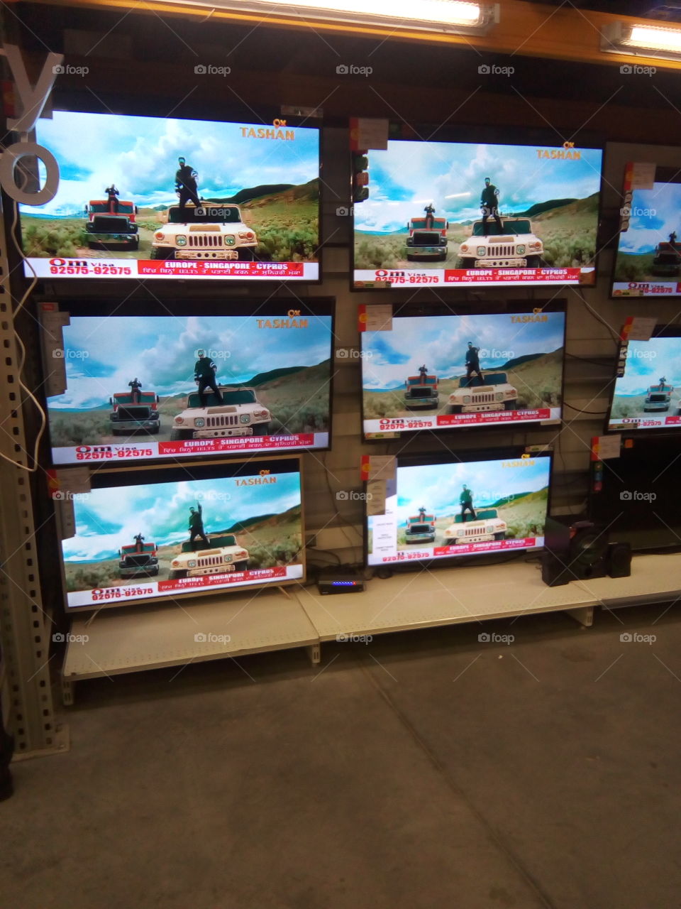 TV sets in a mall.