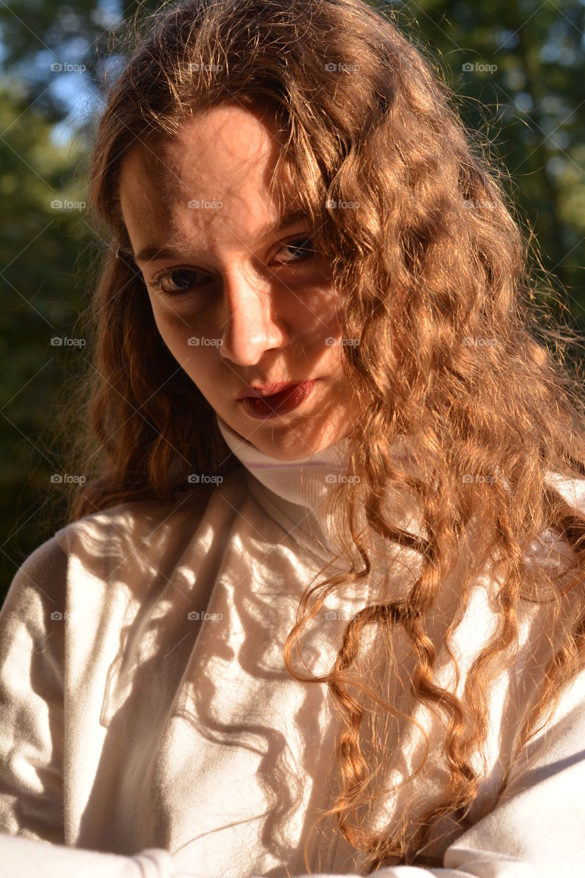 girl beautiful portrait close up in the sunlight