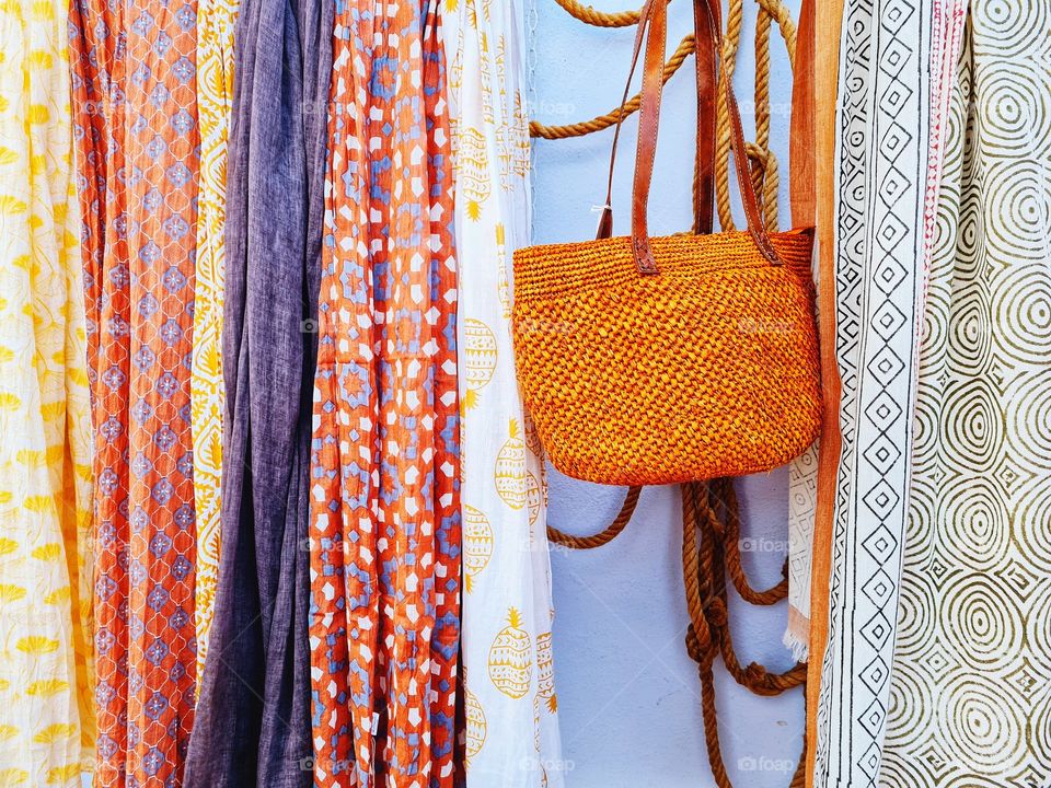 detail of foulards for sale on display in the alleys of the island of Giglio in Tuscany