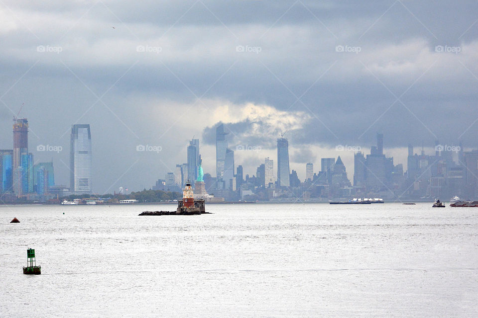 New York City skyline including the statue of liberty and World Trade Center