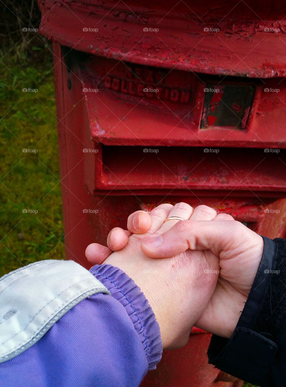 In front of a post  box