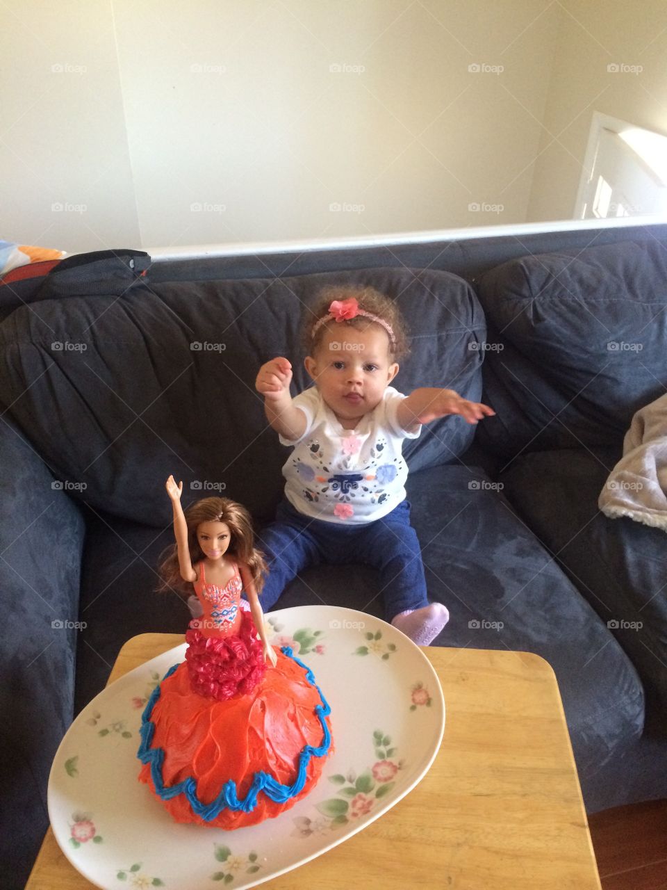 Baby and birthday cake