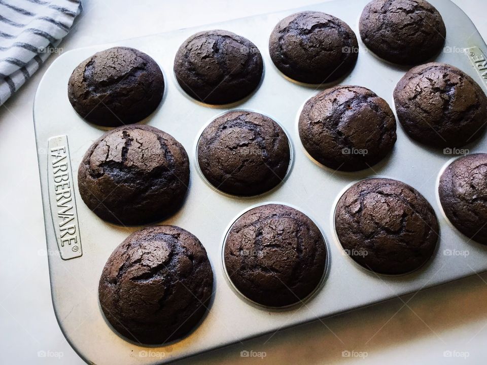 Chocolate muffins in a Farberware non-stick muffin pan