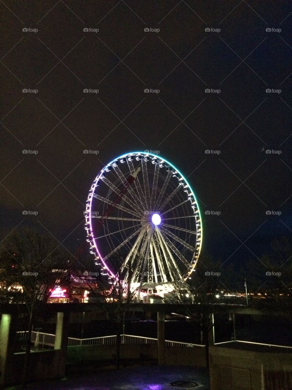 A Ferris wheel at night 