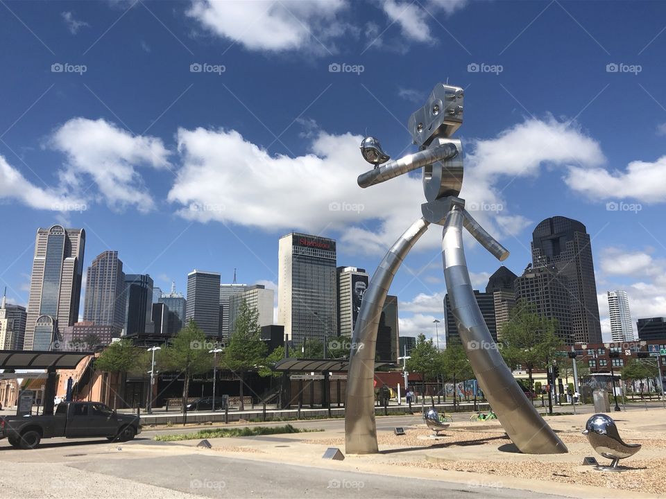 Traveling Man statue overlooking Dallas, Texas
