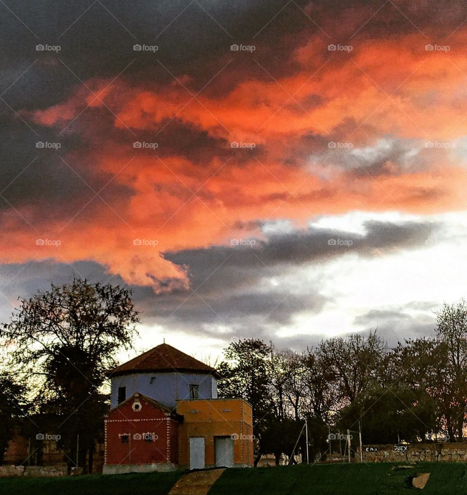 Beautiful background orange and black clouds