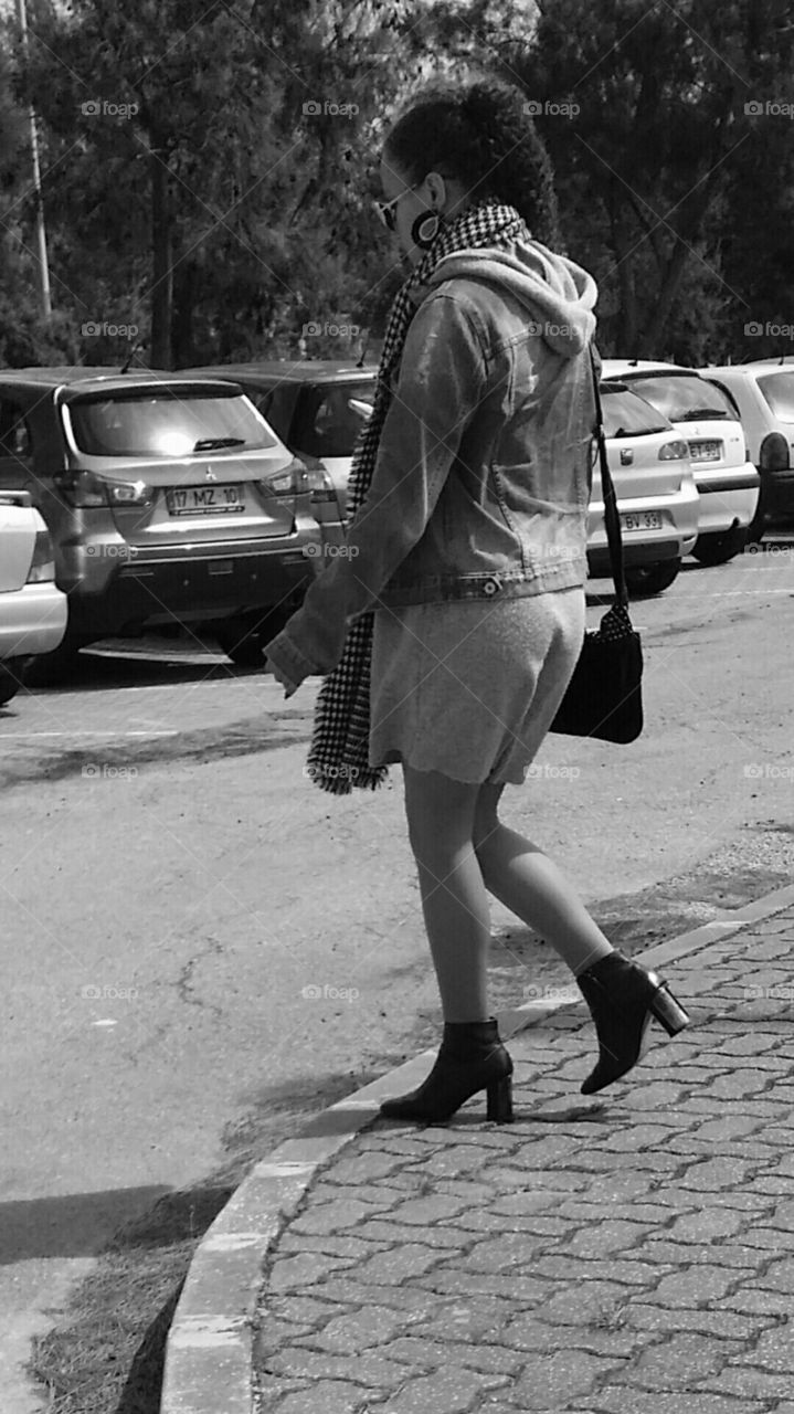 Girl crossing road.