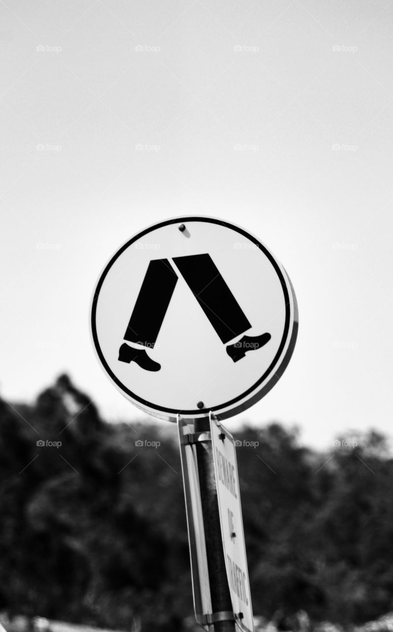 monochrome walking sign