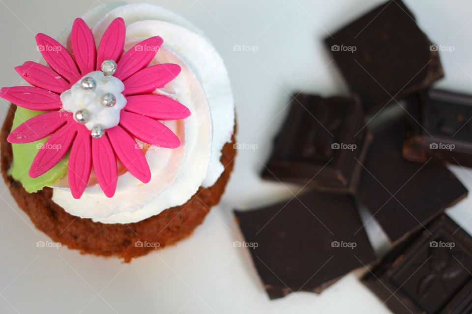 Crazy cupcakes, muffins, a cupcake, a bright cupcake, a cupcake with cream, Cake, sweetness, dessert, cream, bright cake, sugar, delicious cake, flower, cake with flower, color, Fruitcake