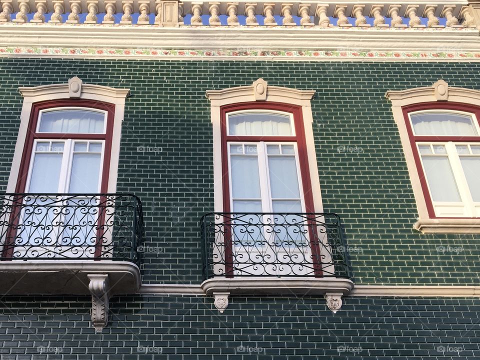 Typical house in green and white