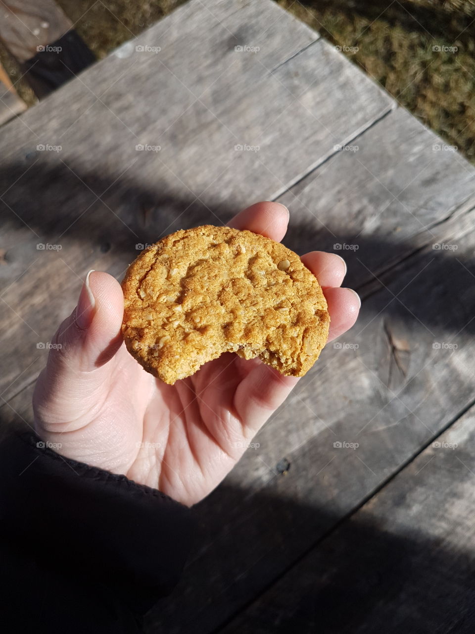 holding biscuit in hands