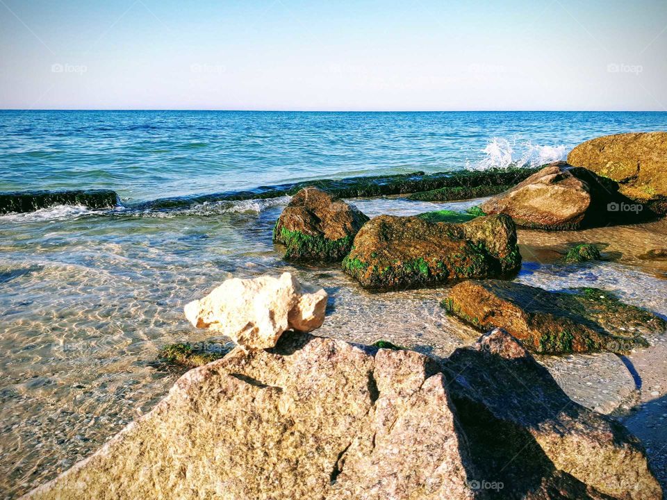 Ukrainian summer sea beach with rocks