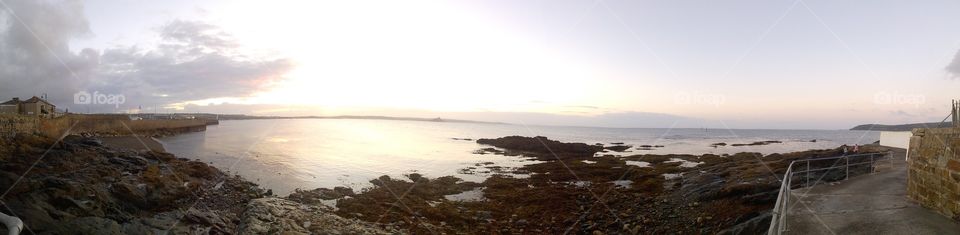 Panoramic view of the morning sun rising over Penzance