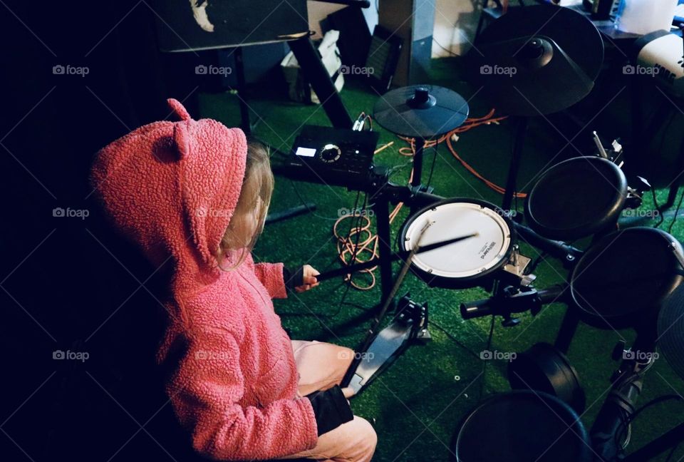 Playing drums Barbie style 