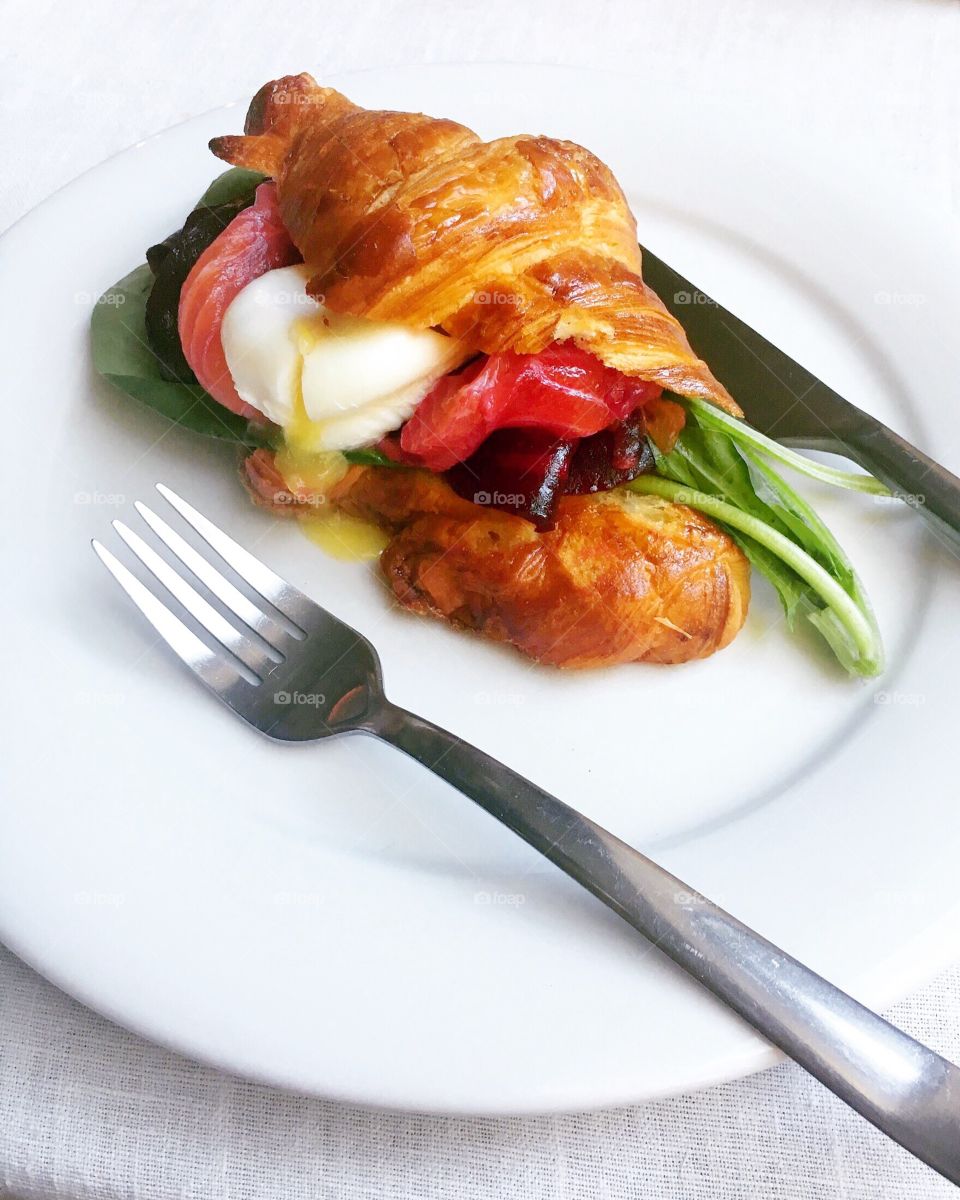 Croissant with poached egg