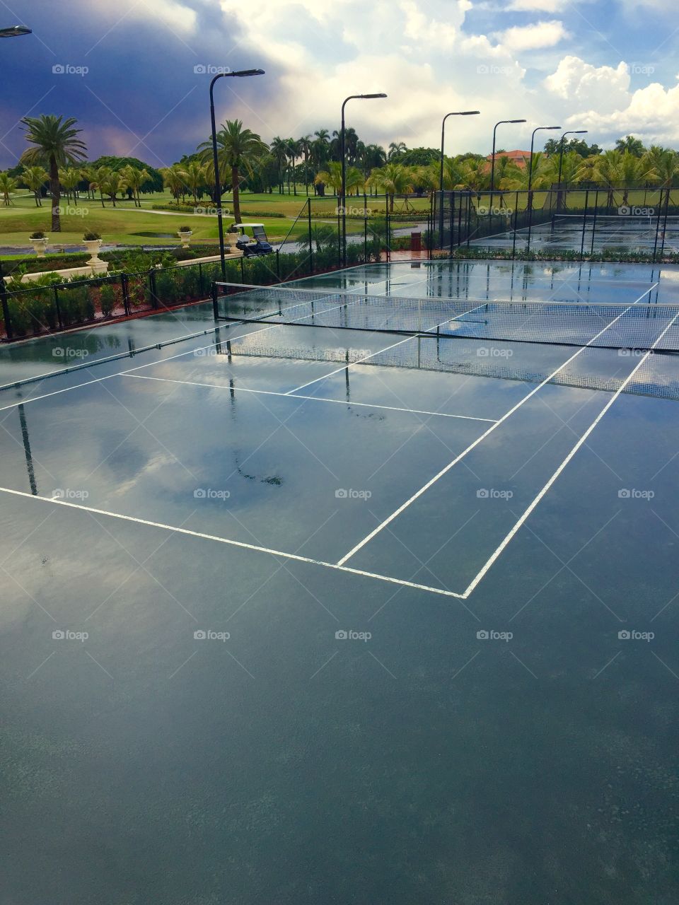 Tennis. Wet tennis court in resort, Doral, Florida