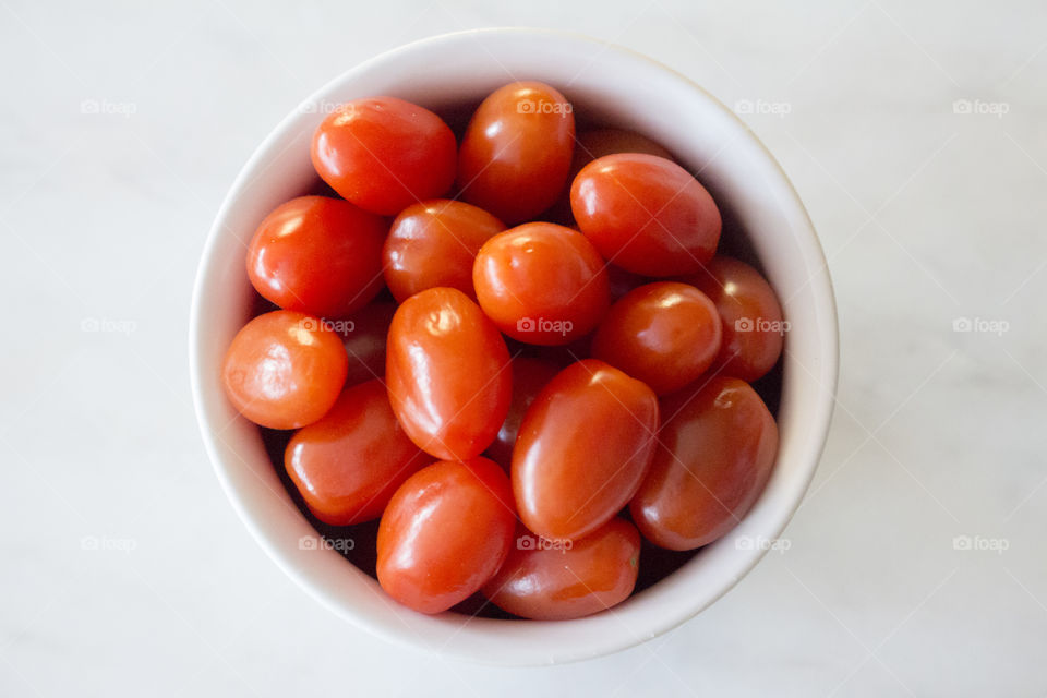 Mini tomatoes in a white bowl 