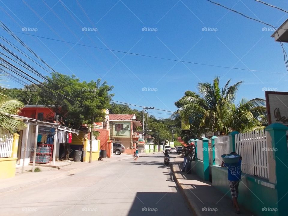 Photo from moving car traveling in Roatan, Honduras