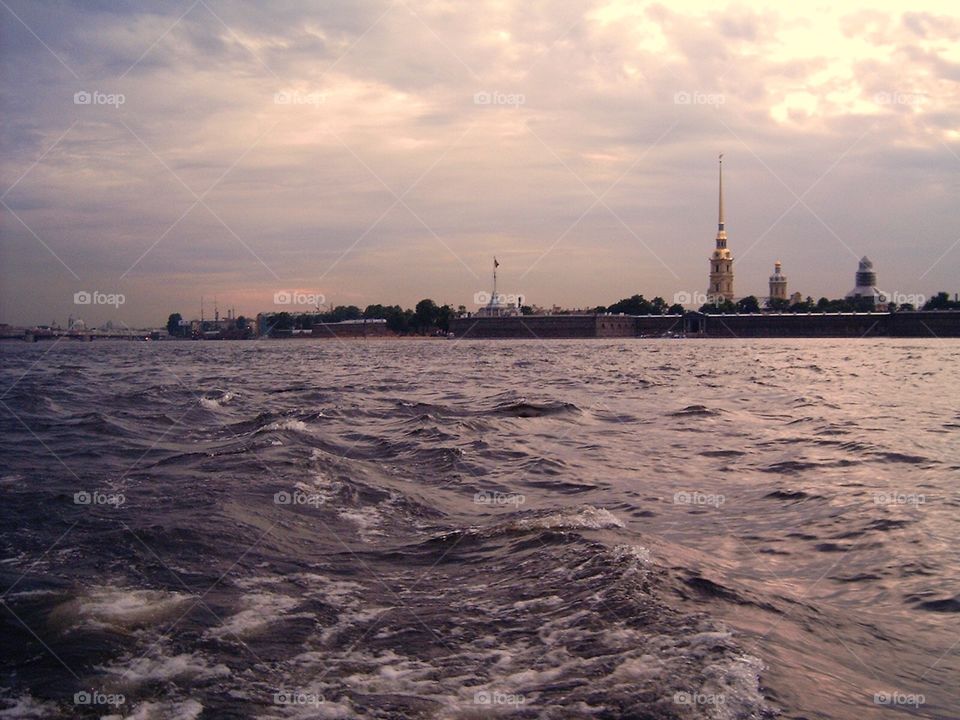 Sunset in city on the water