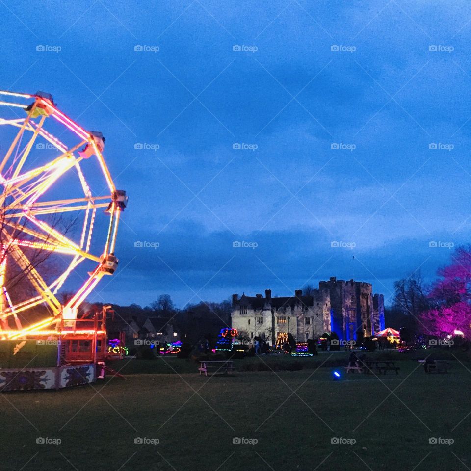 A beautiful scenery photo of Hever castle in Kent at Christmas time. A lot up Ferris wheel to the edge. I think it captures a slight magical feel that Christmas often has.