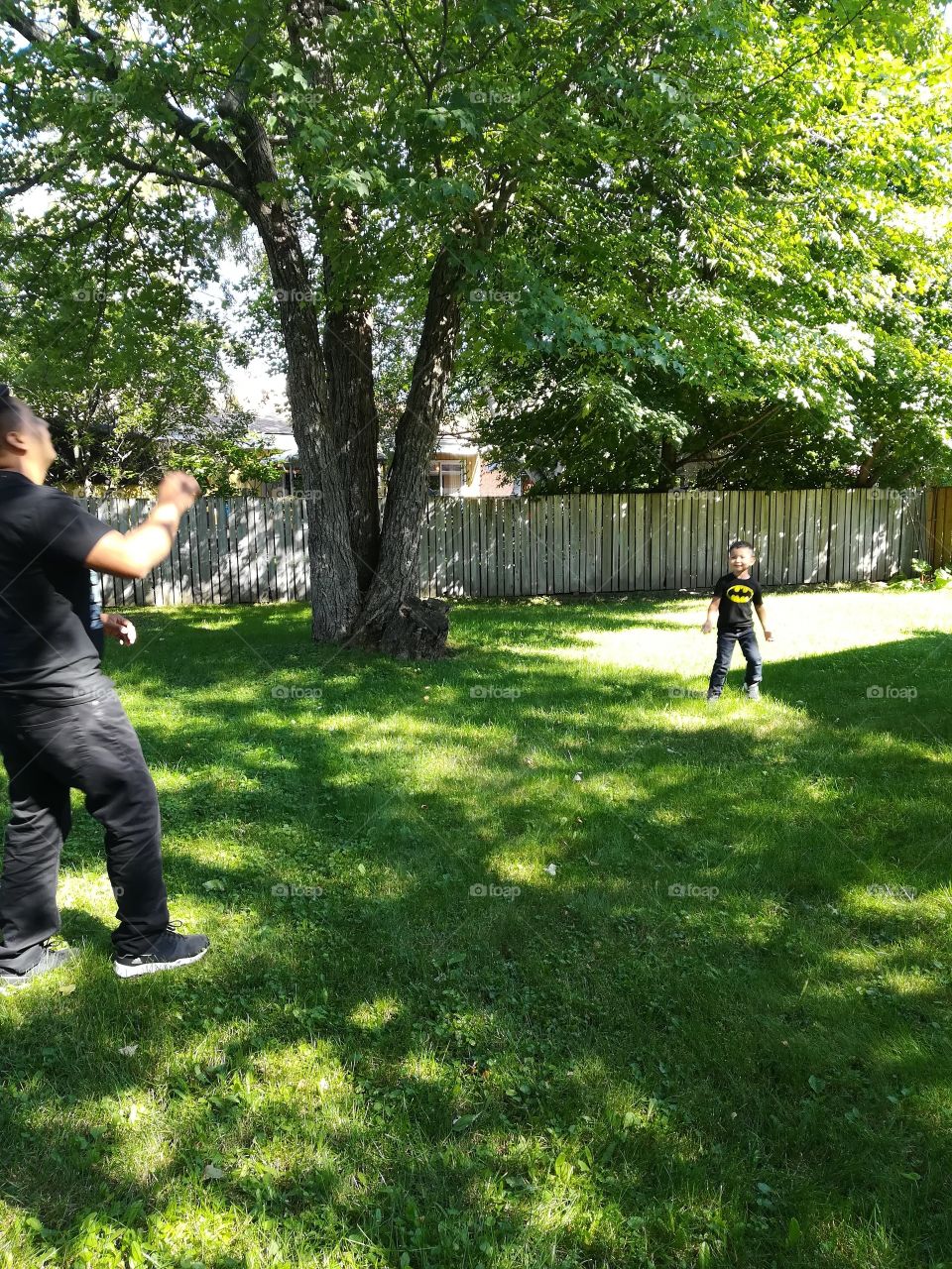 Playing catch in the backyard