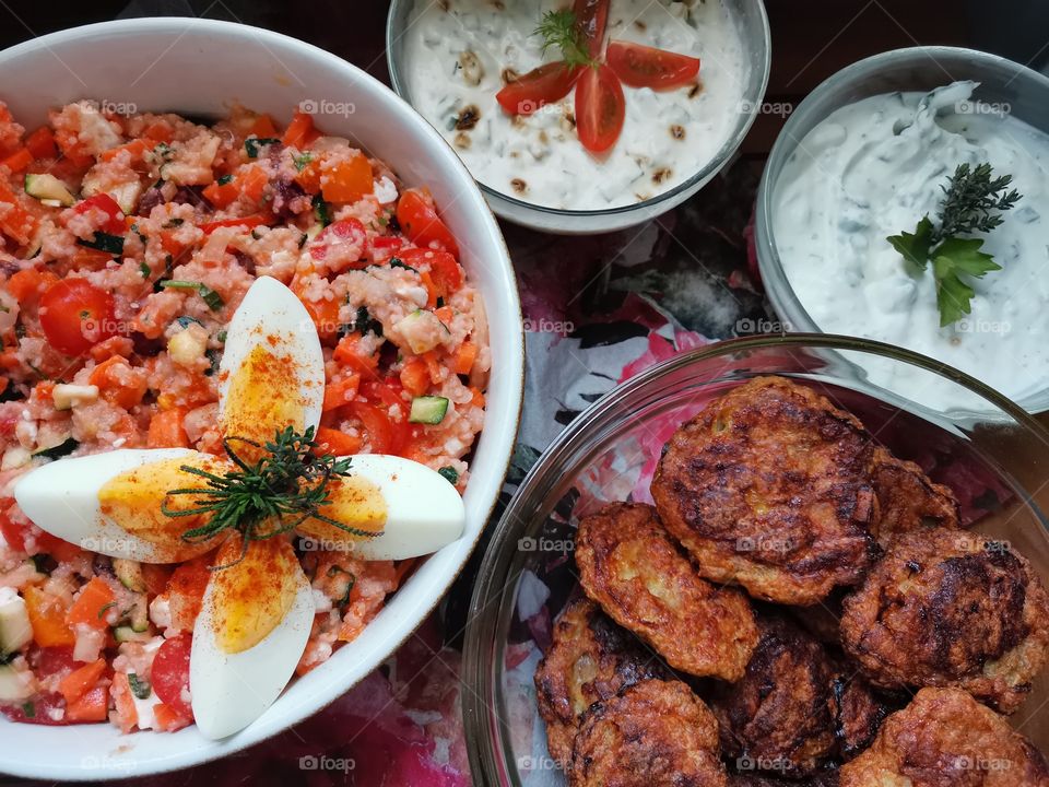Barbecue buffet with couscous dips and fried meatball