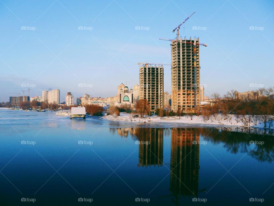 reflection of the building on the river