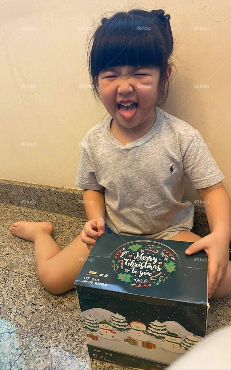 Happiness smile with Christmas gift.