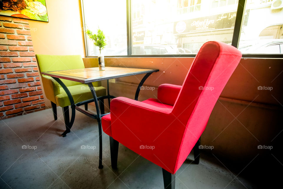 Red an green chairs on coffe shop
