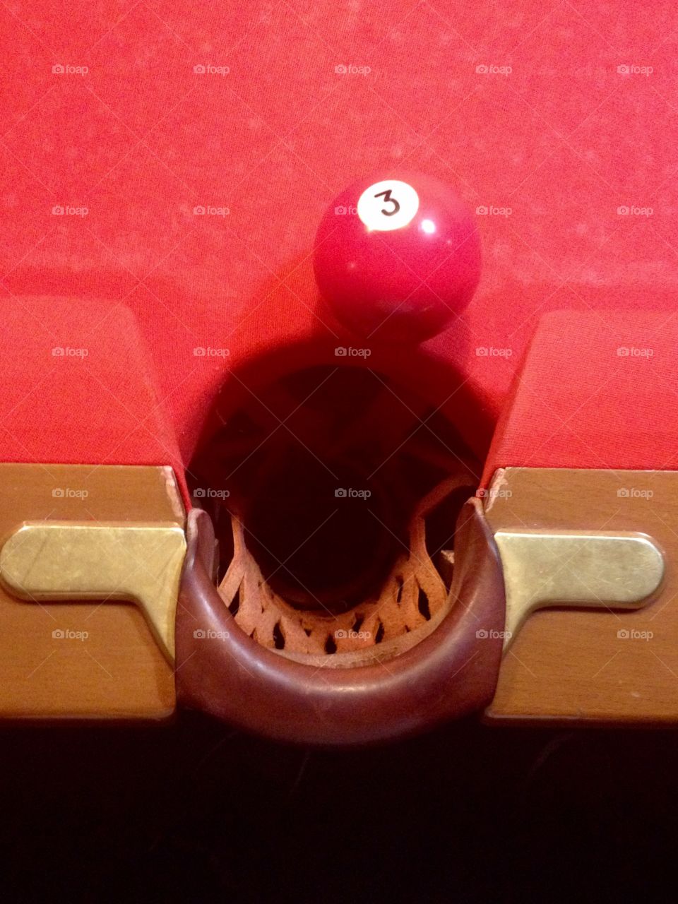 Billiard pocket and ball