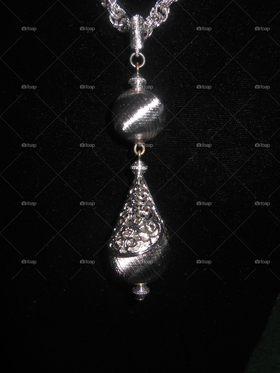 Silver tone pendant