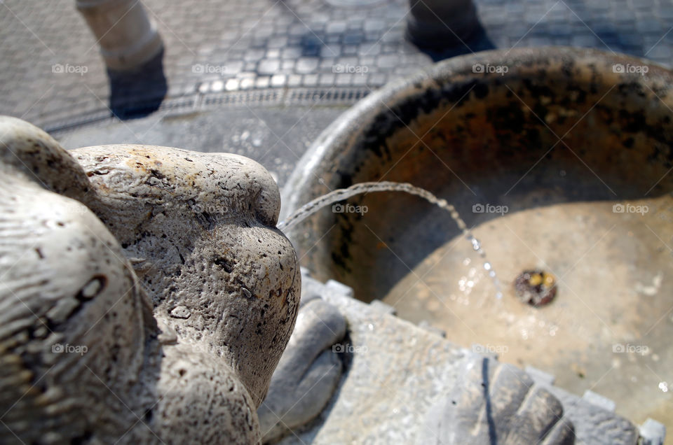 Close-up of grey coloured fountain in Budapest, Hungary.