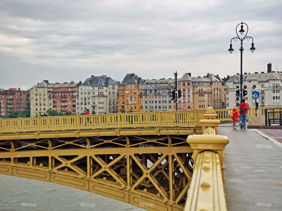 People crossing the Margret Bridge, Budapest, Hungury