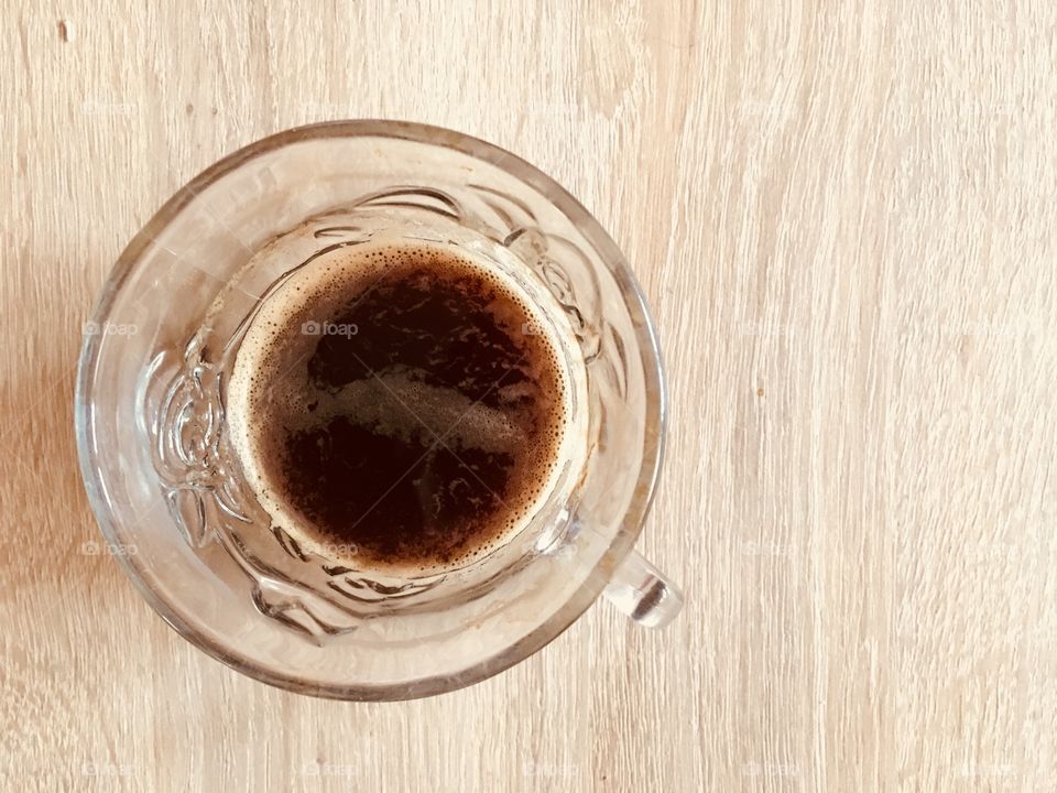 Coffee cup on wood table