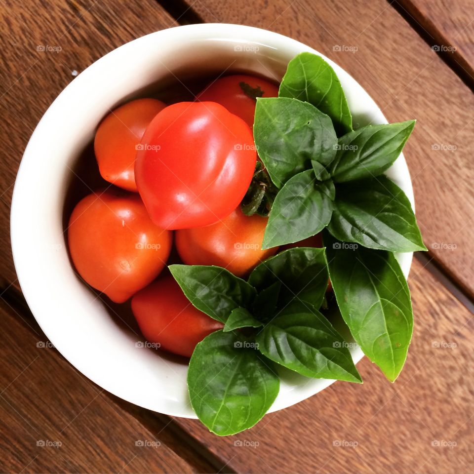 Fresh cherry tomato and basil