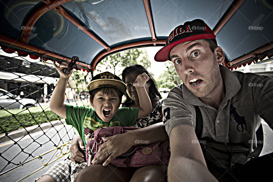Family selfie. Benbdprod with family on a taxi tuk tuk Bangkok