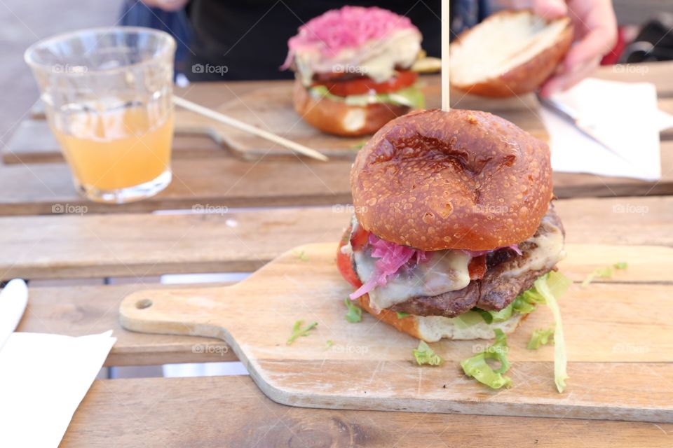 Homemade hamburgers to bee eaten outdoors