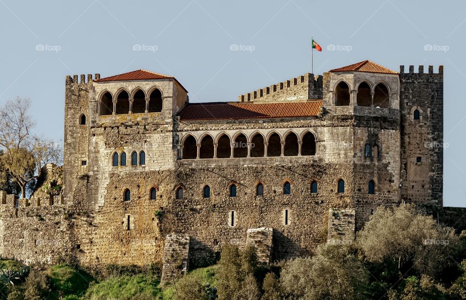 Castelo de Leiria flying the Portuguese flag